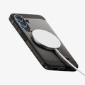 ACS09009 - Galaxy S25 Case Tough Armor AI (MagFit) in Gunmetal showing the back, partial side and bottom with magsafe charger attached