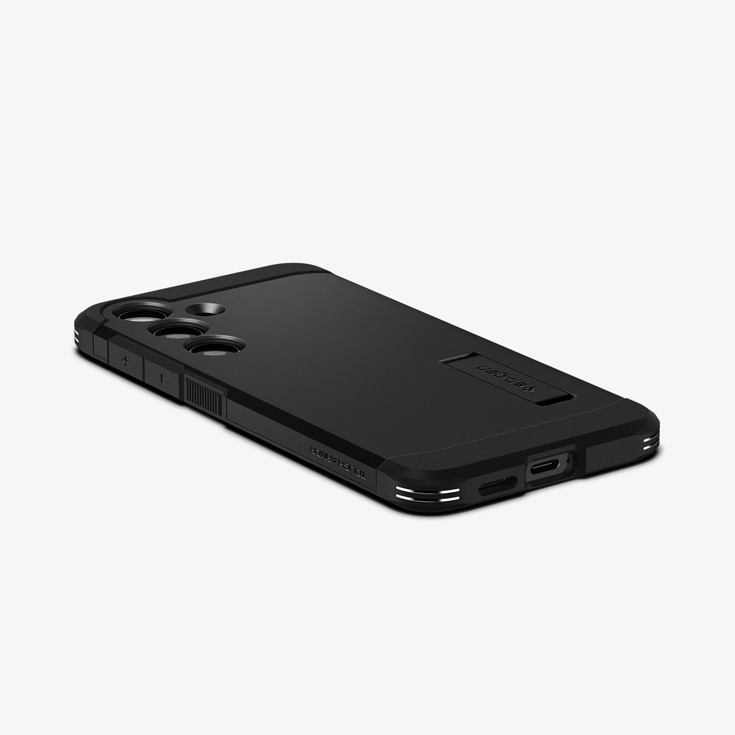 ACS07355 - Galaxy S24 Case Tough Armor in Black showing the back, partial side and bottom on a flat surface