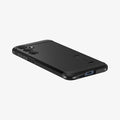 ACS07530 - Galaxy A55 5G Case Tough Armor in Black showing the back, partial side with side buttons and bottom on a flat surface