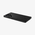 ACS07194 - Galaxy S24 Ultra Case Core Armor in Matte Black showing the back, partial bottom and partial side with side buttons on flat surface