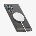 ACS08952 - Galaxy S25 Ultra Case Rugged Armor (MagFit) in Marble Gray showing the back, partial side and bottom with magsafe charger attached