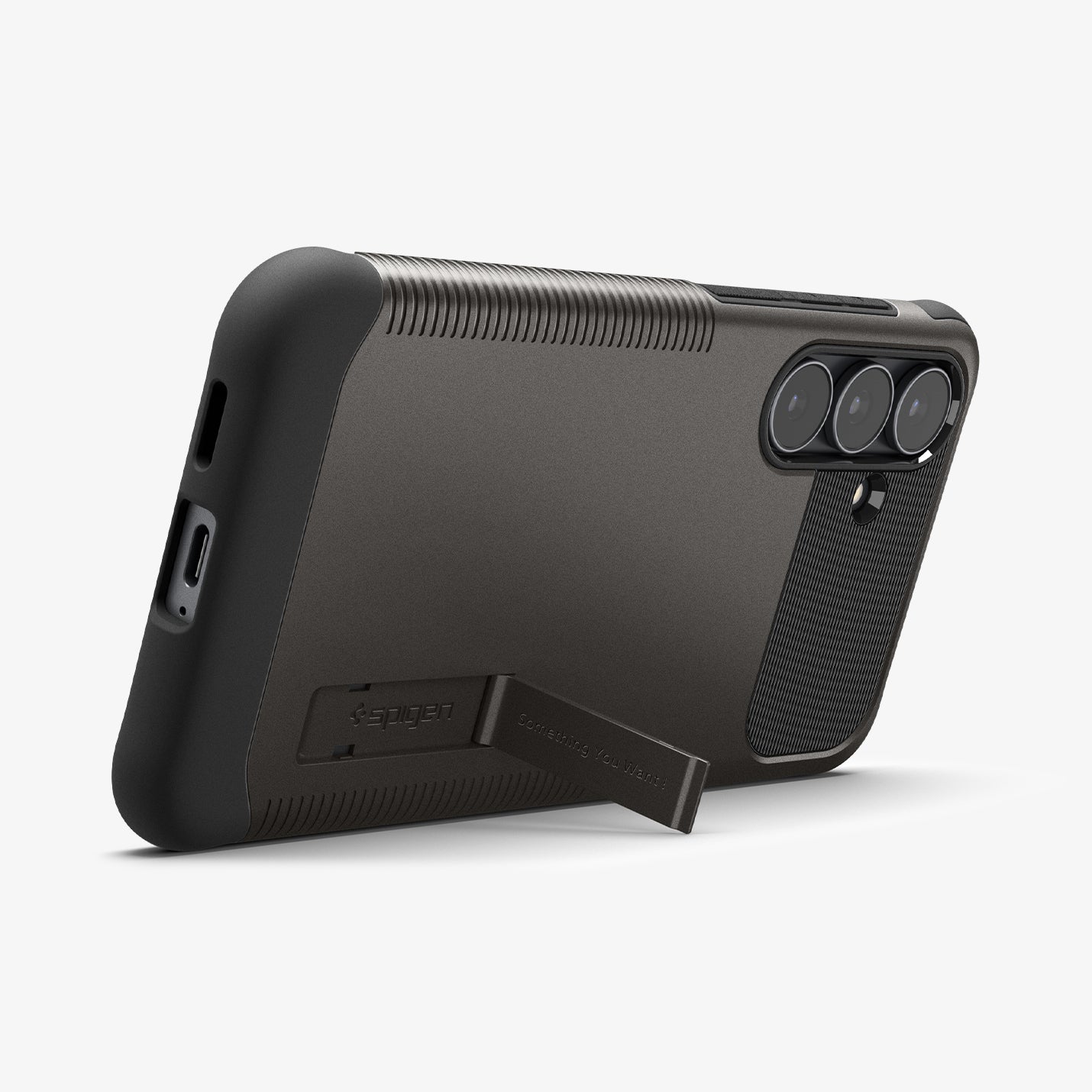 ACS10230 - Galaxy S25 FE Slim Armor (MagFit) in Gunmetal showing the back, bottom and partial side with a built-in kickstand propped up