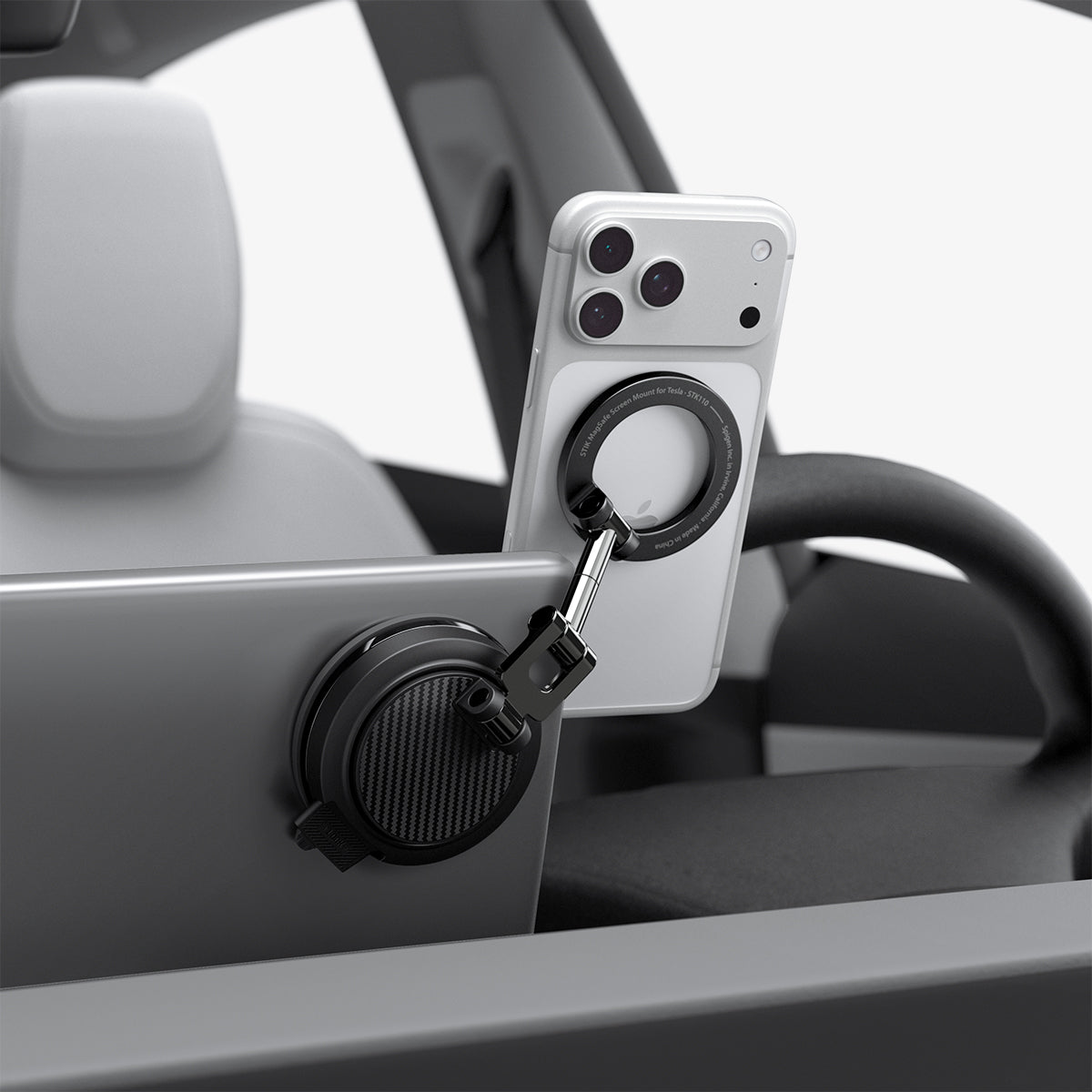 ACP11657 - Spigen MagSafe car mount holding iPhone on Tesla screen edge with suction cup base