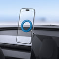 ACP11657 - Spigen MagSafe car mount holding iPhone on dashboard with magnetic ring attachment