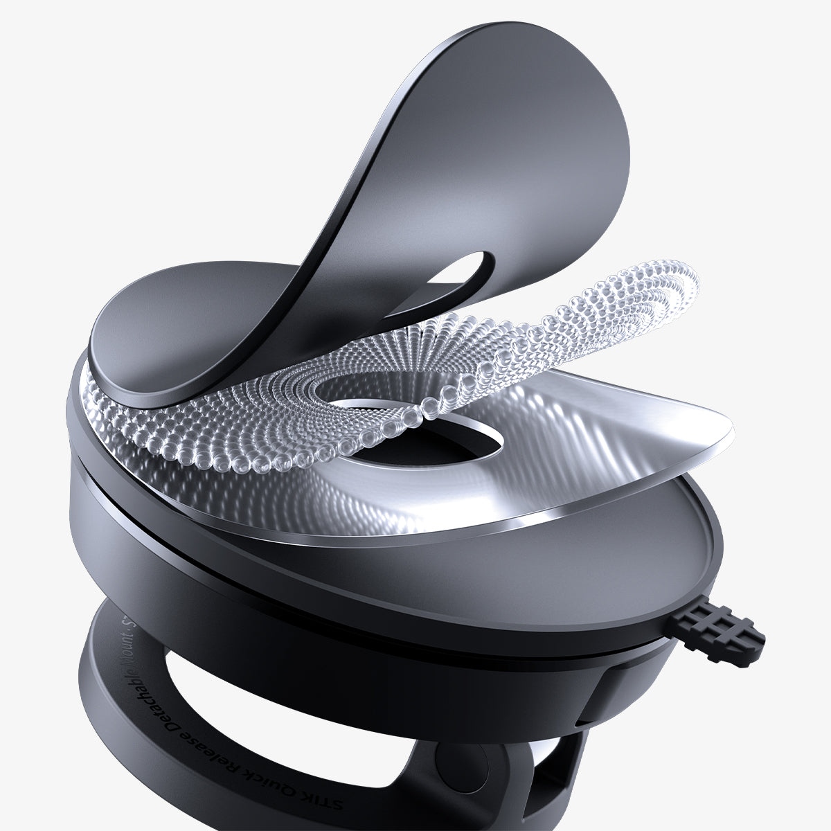 ACP11839 - Close-up of the Spigen STK120 quick-release lever mechanism used to detach the mount ring from its base