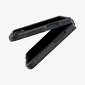ACS11798 - Galaxy Z Flip 8 Series - Core Armor (Mag Fit) showing the Galaxy Z Flip 8 opened at an angle with the Core Armor MagFit case, top and bottom halves splayed apart to highlight the case's texture and hinge coverage.