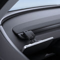 ACP11873 - Close-up angled view of the Spigen magnetic phone mount folded down with a phone attached at a low profile