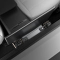 ACP11105 - Tesla Series - Under Screen Organizer | TO227JH showing under screen organizer mounted beneath Tesla center console seat rail from side angle