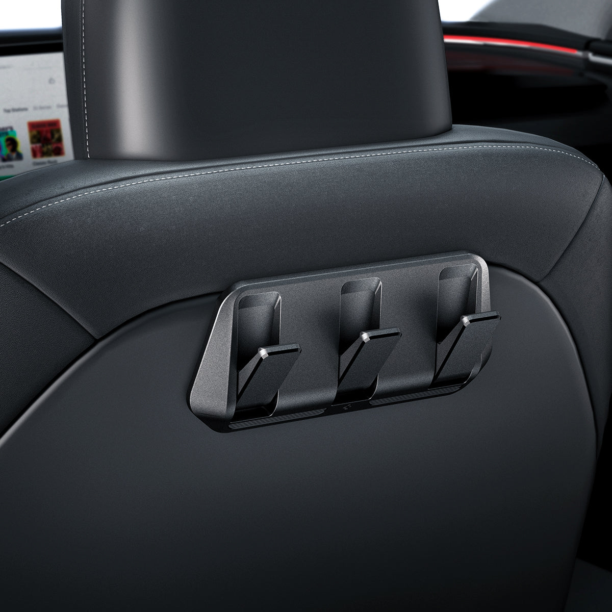 ACP09201 - Tesla Model 3 (2017-2023) Car Seat Hook TO283 in Black showing the front partial side installed at the back of the driver's seat