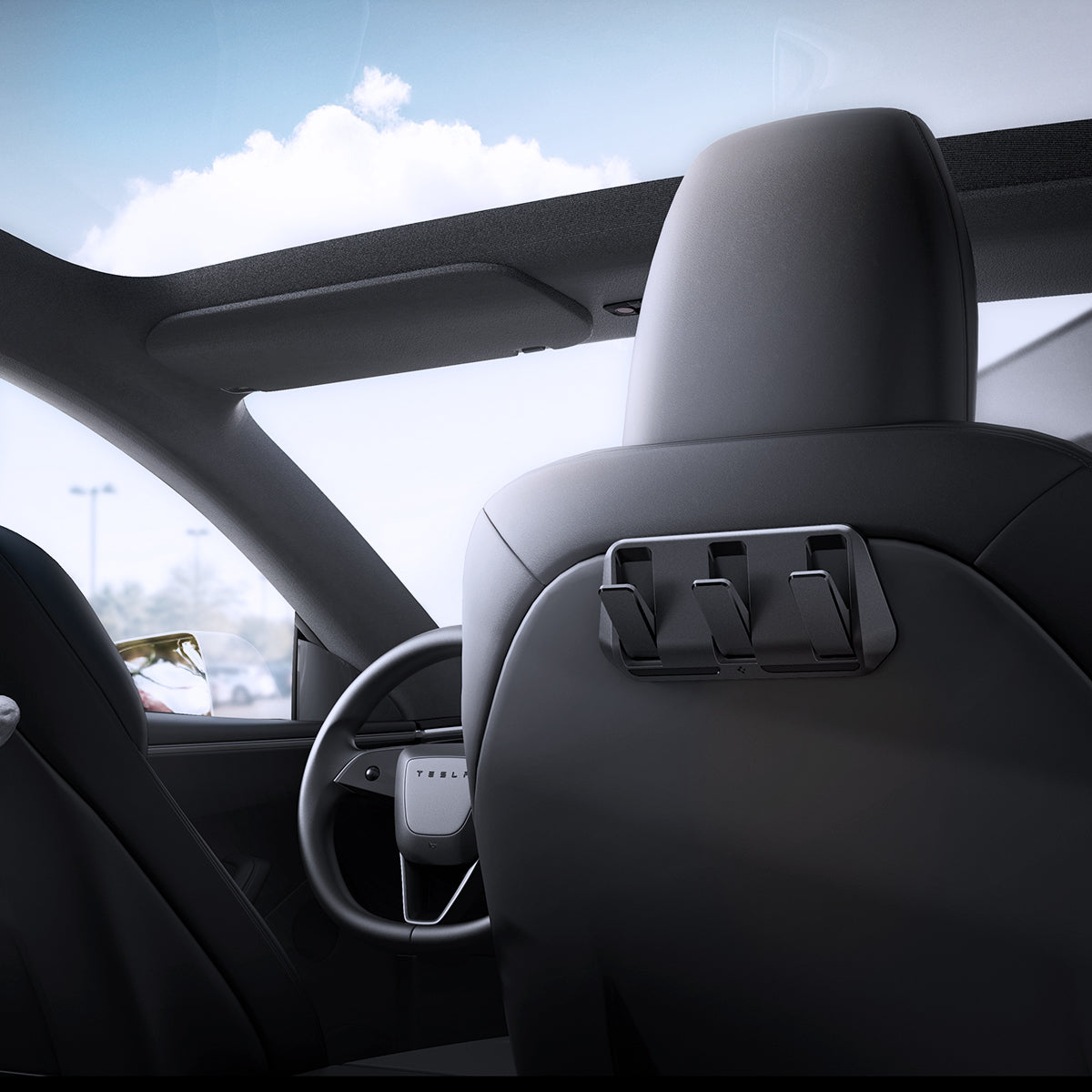 ACP09201 - Tesla Model 3 (2017-2023) Car Seat Hook TO283 in Black showing the front, partial side and bottom, car seat installed at the back of front seat beside the driver seat