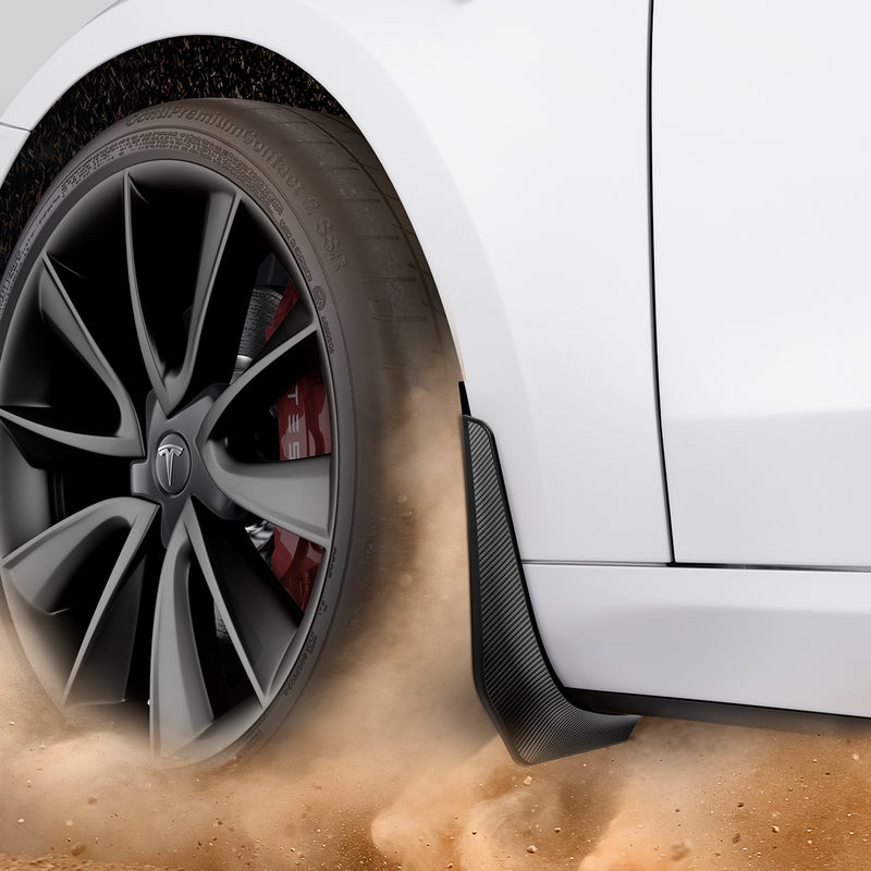 ACP04511 - Tesla Model 3 WeatherBloc Mud Flaps showing the mud flaps installed and dirt hitting it