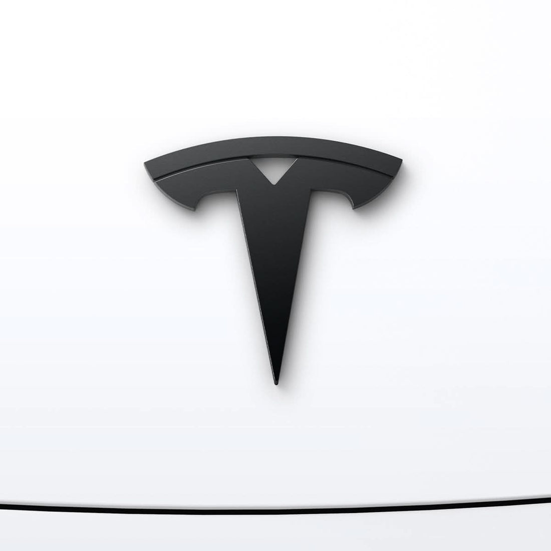 ACP08547 - Tesla Model 3 Highland Front Emblem Logo Cover TO321H in Black showing the front and partial side