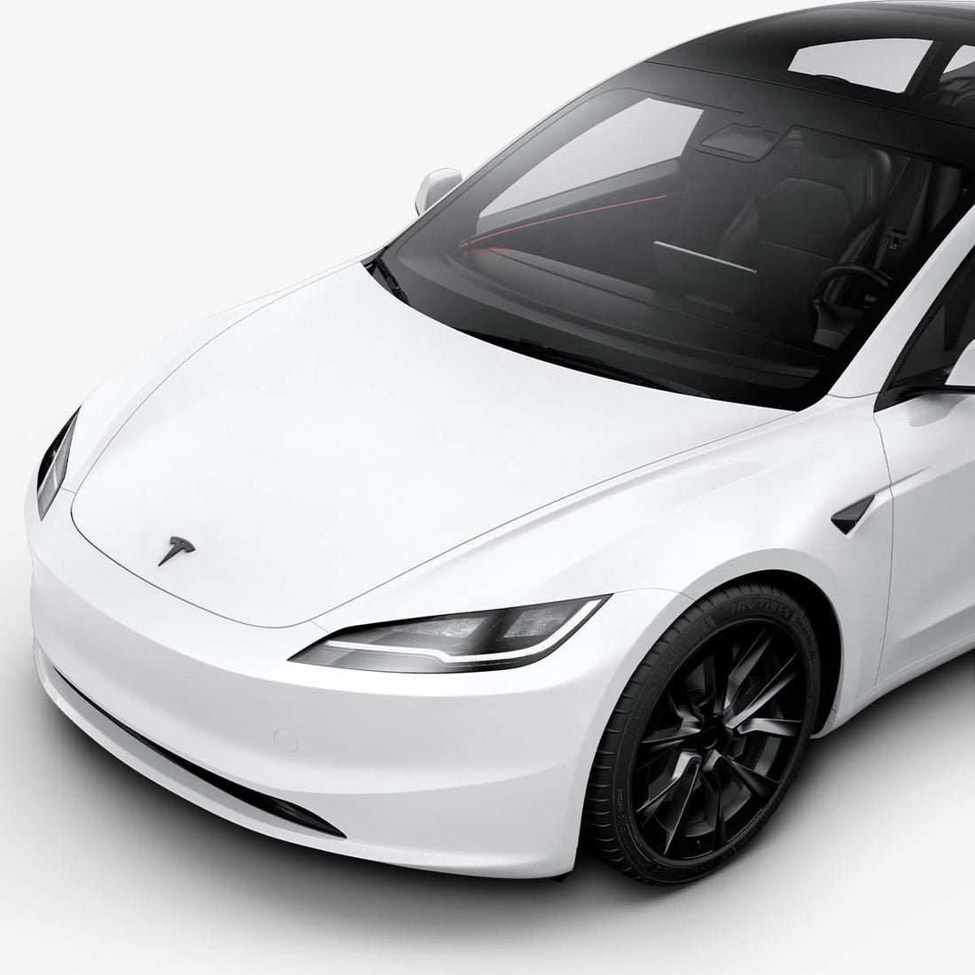 ACP08547 - Tesla Model 3 Highland Front Emblem Logo Cover TO321H in Black showing the attached to the front of the tesla car on a side view