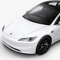 ACP08547 - Tesla Model 3 Highland Front Emblem Logo Cover TO321H in Black showing the attached to the front of the tesla car on a side view