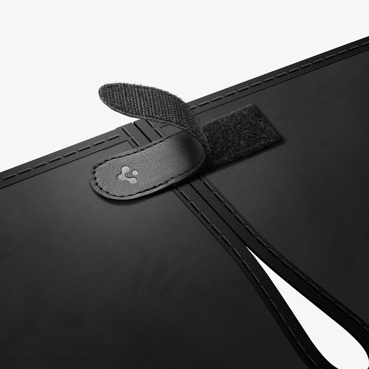 ACP11460 - Universal CryoShade UO260 M showing close-up of velcro strap and branded leather tab fastener on black fabric edge