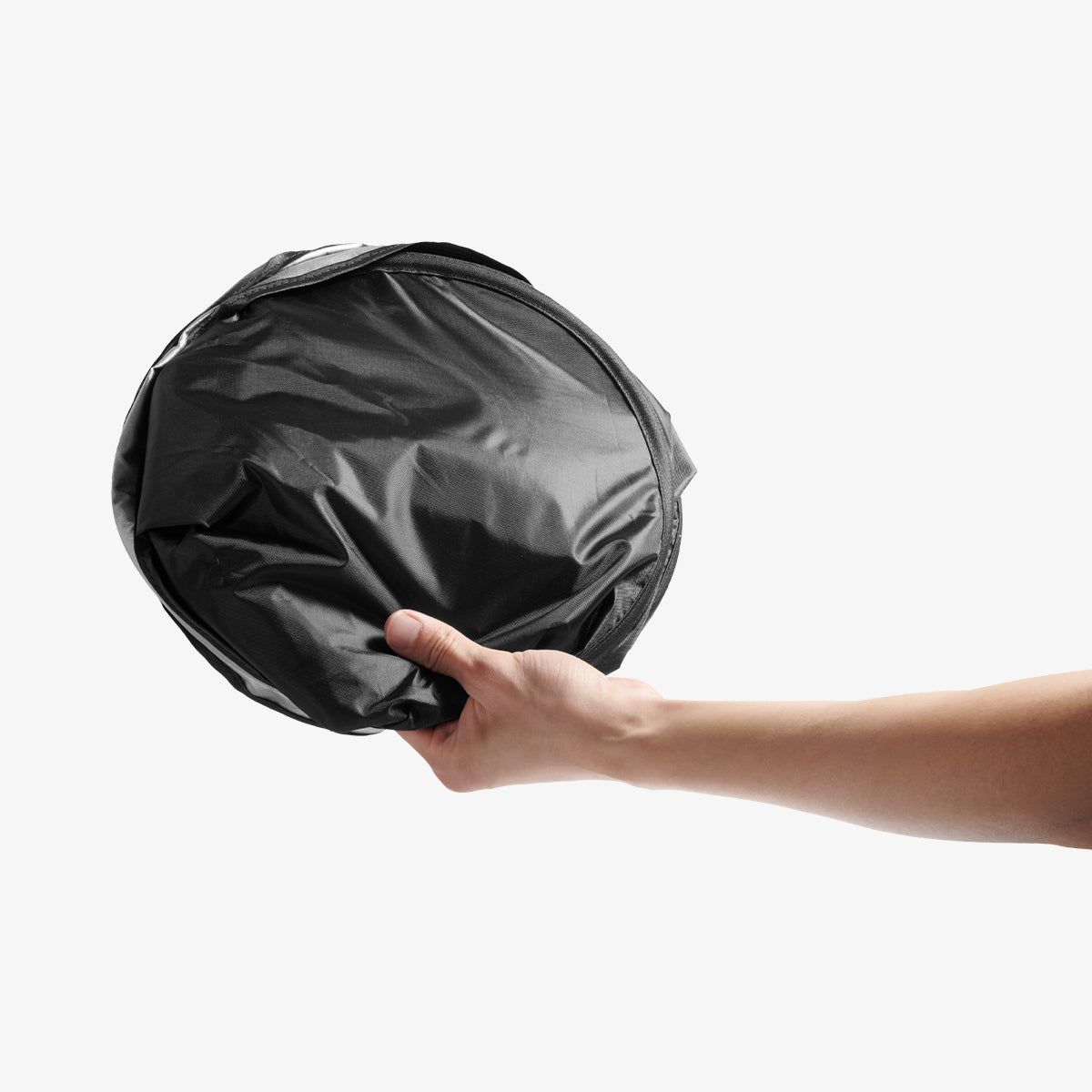 ACP11460 - Universal CryoShade UO260 M showing sunshade collapsed into small circular disc held in one hand