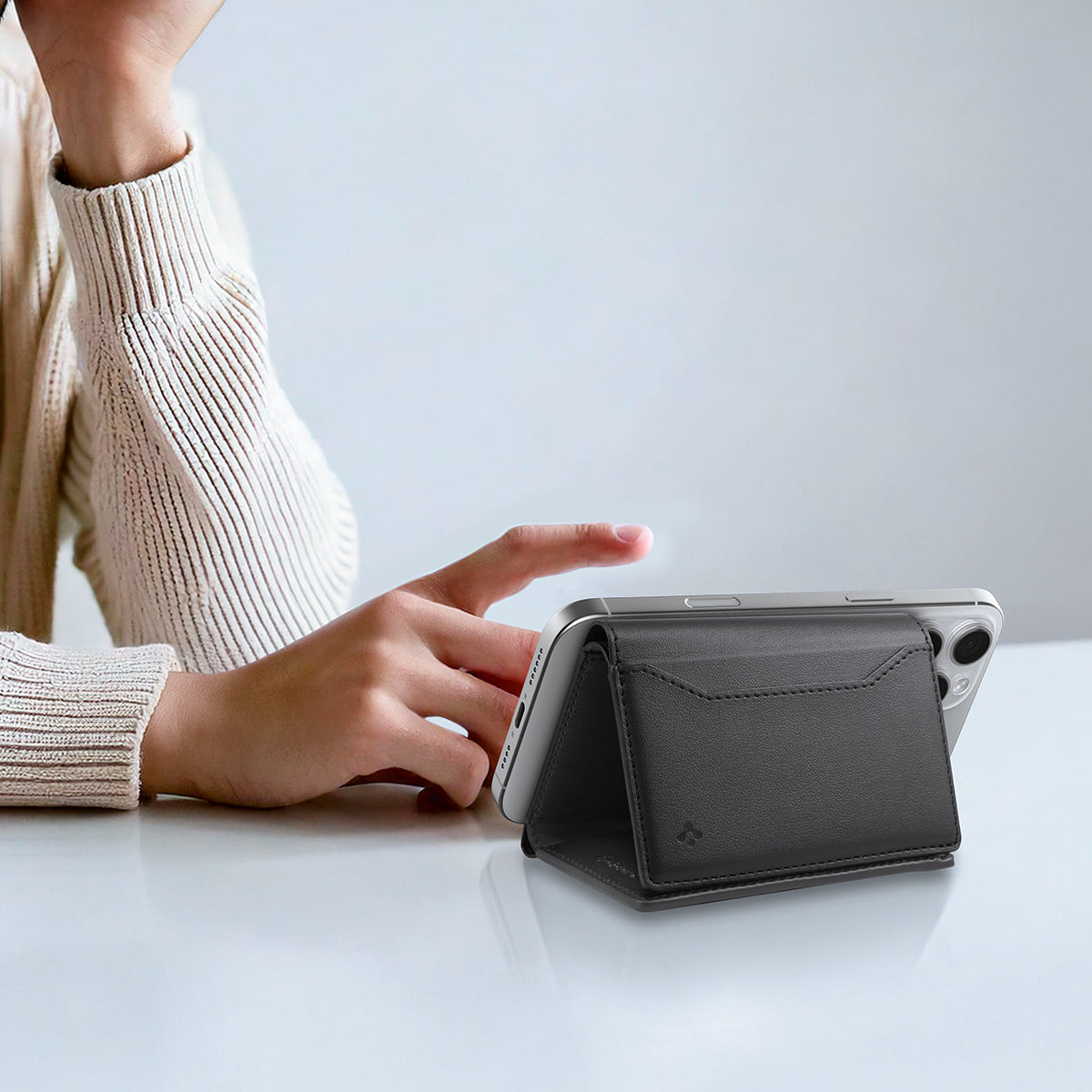 AFA09133 - MagSafe Card Holder Valentinus S (MagFit) in Black showing the wallet propped up as a stand