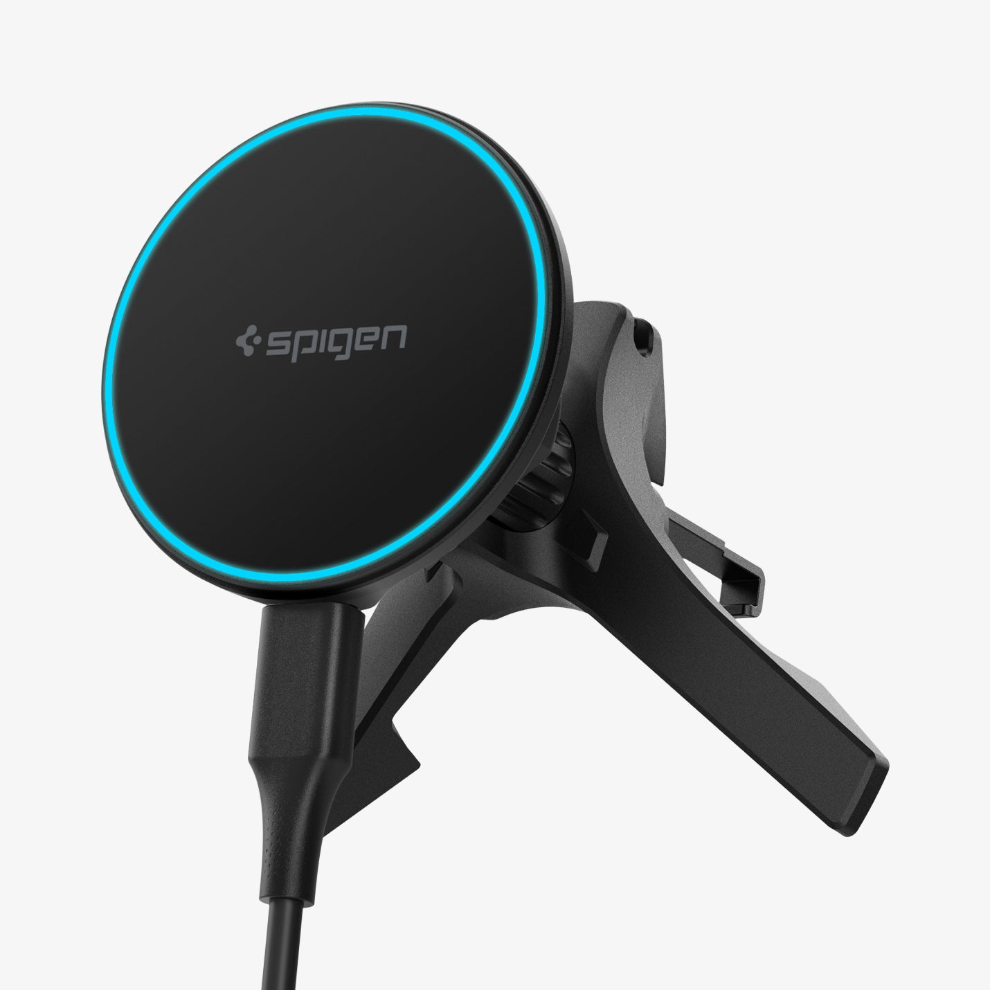 ACP10513 - Spigen Essential Qi2 Wireless Car Charger angled view showing LED charging ring and air vent mounting clip