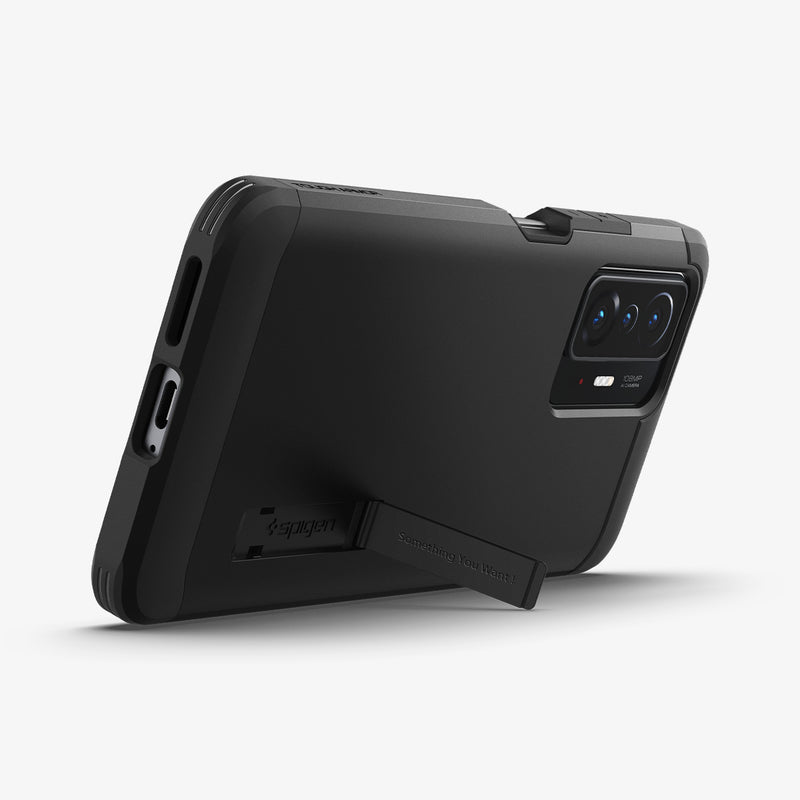 ACS03863 - Xiaomi 11T Pro Tough Armor Case in Black showing the back and partial side with the propped up built-in kickstand