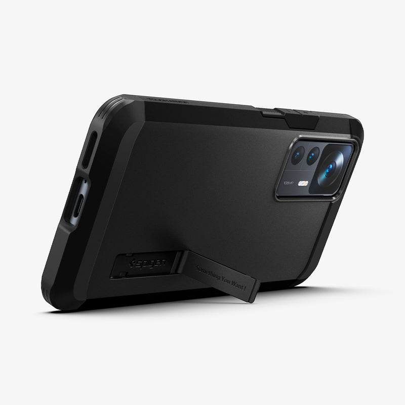 ACS05300 - Xiaomi 12T Pro Tough Armor Case in Black showing the back and partial side with propped up built-in kickstand