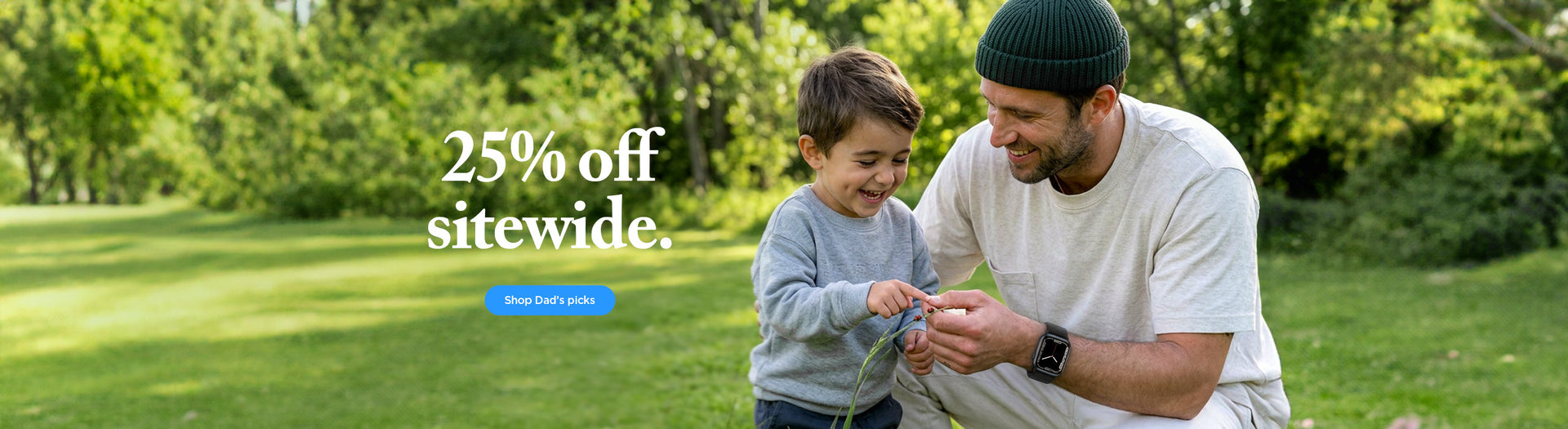 Father and young child playing outdoors in a park with 25% off sitewide promotional banner