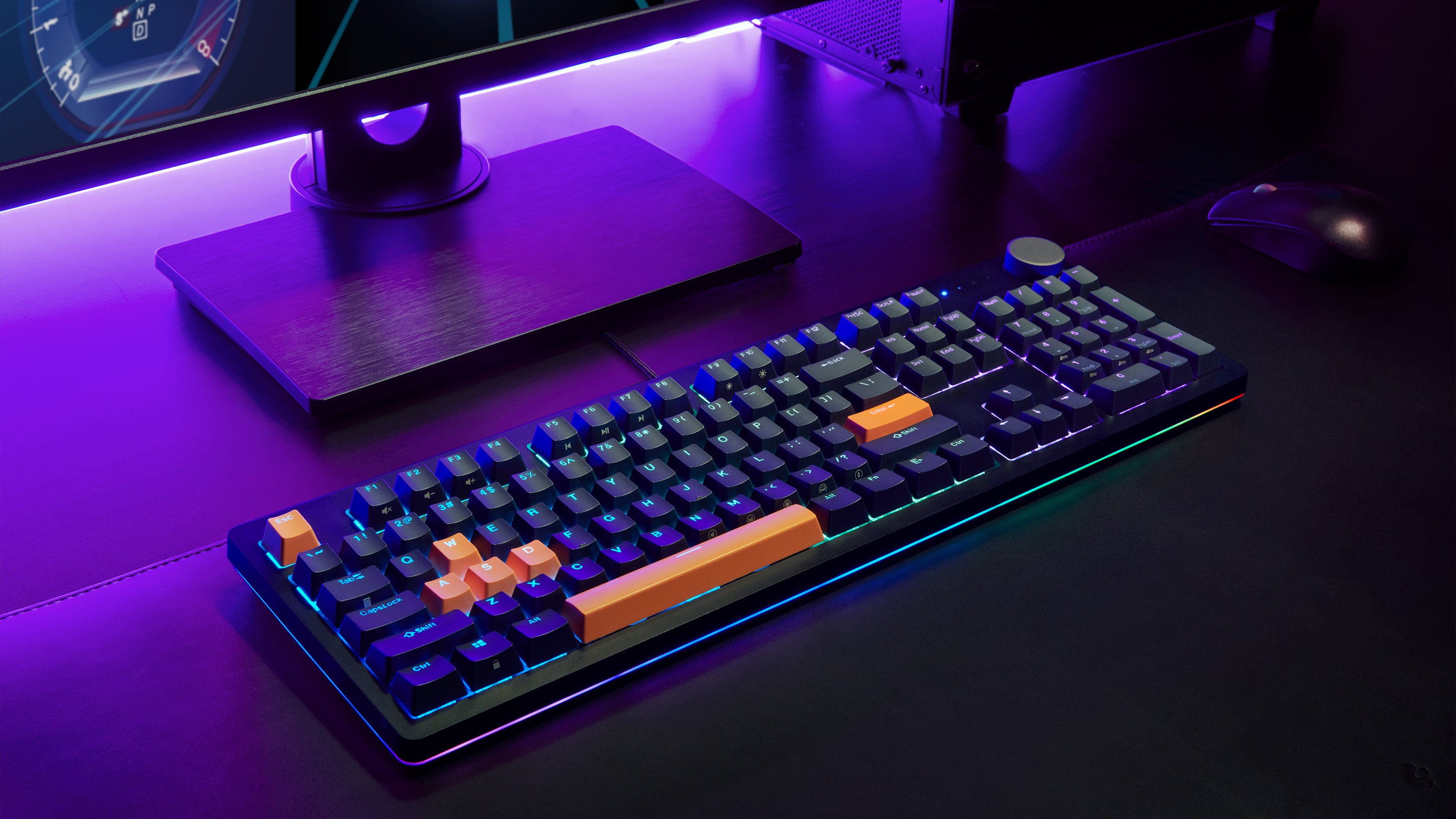 Desk with computer, mouse, and Spigen Keyboard