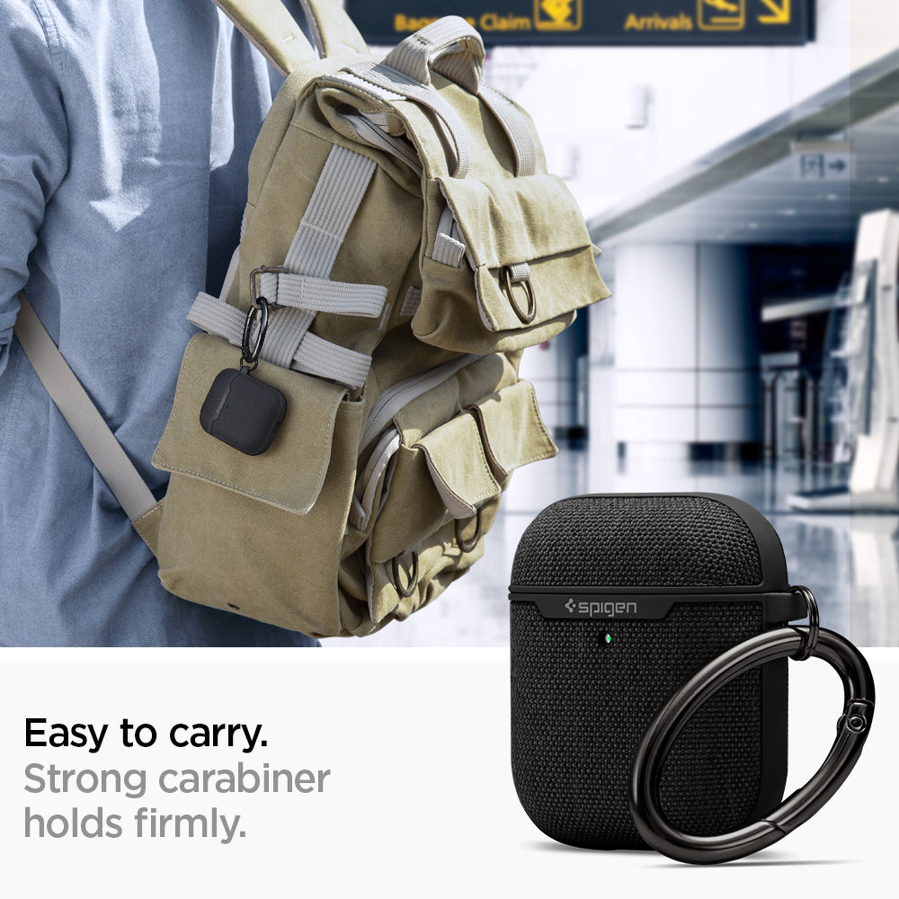 074CS27030 - Apple AirPods 1 / 2 Case Urban Fit in black showing how it is easy to carry. Strong carabiner holds firmly