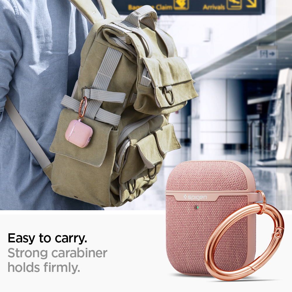 074CS27598 - Apple AirPods 1 / 2 Case Urban Fit in rose gold showing how it is easy to carry. Strong carabiner holds firmly