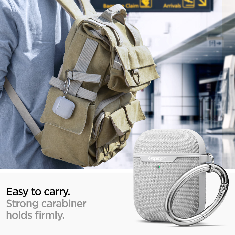 074CS27031 - Apple AirPods 1 / 2 Case Urban Fit in gray showing how it is easy to carry. Strong carabiner holds firmly