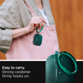 ASD00825 - Apple AirPods Pro Case Urban Fit in midnight green showing how it is easy to carry. Strong carabiner firmly hooks on