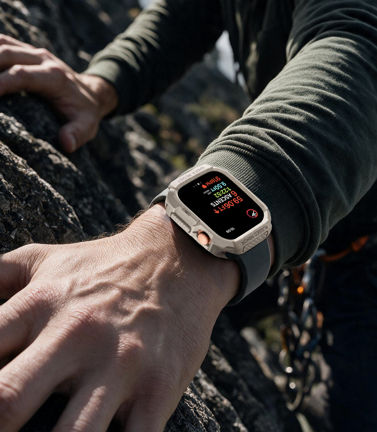 ACS11889 - Apple Watch Series 12 (46mm) Case Rugged Armor in Dune Beige showing the rugged protective case worn during an outdoor climbing activity