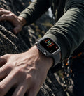 ACS11887 - Apple Watch Series 12 (46mm) Case Rugged Armor in Dark Gray showing the rugged protective case worn during an outdoor climbing activity
