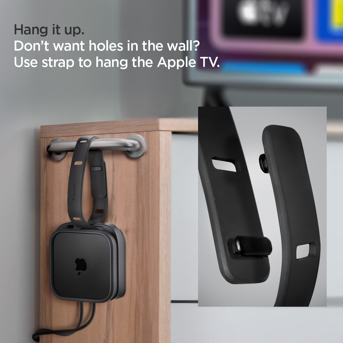 AMP05858 - Apple TV 4K (3rd Gen) Mount Silicone Fit in black showing the strap to hang the Apple TV without any holes in the wall