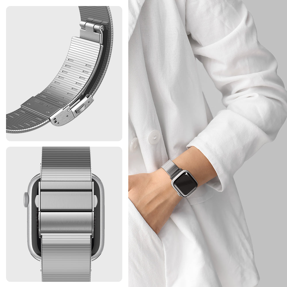 AMP07225 - Apple Watch (41mm) Sleek Link in Silver showing the side and back of the watch, wearing it and has his hands in his pockets.