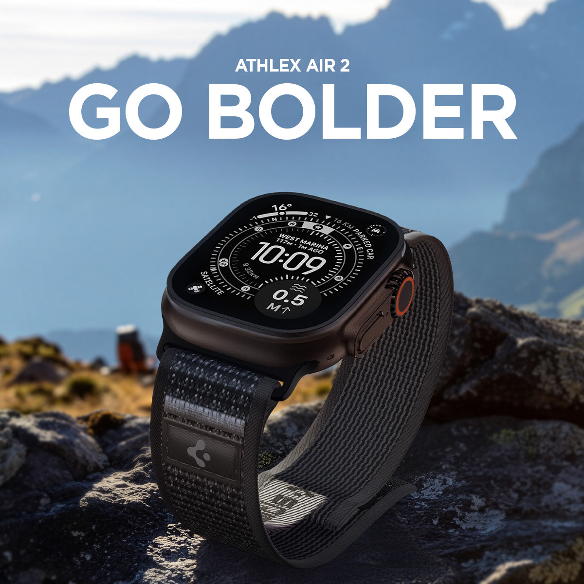 AMP11113 - Apple Watch Ultra Athlex Air 2 band black gray lifestyle image showing Apple Watch Ultra worn with rugged Athlex Air 2 strap placed on rocky mountain terrain with bold outdoor backdrop and GO BOLDER headline