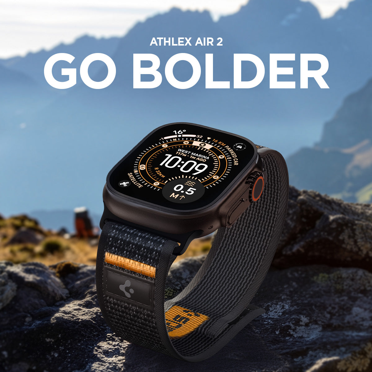 AMP10607 - Apple Watch Ultra Athlex Air 2 band black orange lifestyle image showing Apple Watch Ultra worn with rugged Athlex Air 2 strap placed on rocky mountain terrain with bold outdoor backdrop and GO BOLDER headline