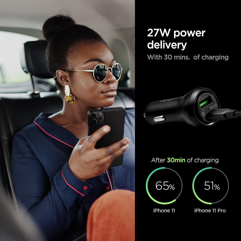 000CP25597 - Essential® Dual Port 27W F31QC in Black showing the 27W power delivery with 30 mins. of charging After 30min of charging comparison, iPhone 11 with 65% while iPhone 11 Pro with 51%, A woman holding a device inside the car