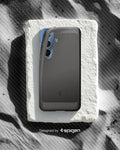 ACS08978 - Galaxy S25 Plus Case Rugged Armor (MagFit) in Marble Gray designed by spigen. Showing the phone with the pattern on the sand. 