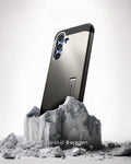 ACS09009 - Galaxy S25 Case Tough Armor AI (MagFit) in Gunmetal showing the back, partial side device sitting on the top of a rock