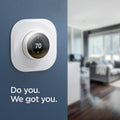AHP03710 - Google Nest Learning Thermostat 3G Wall Plate in white showing the thermostat mounted to a wall