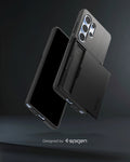 ACS08967 - Galaxy S25 Ultra Case Slim Armor CS in Black showing the back, slider partially open hovering in front of another device showing partial front, side and bottom