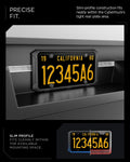 ACP11646 - Tesla Cybertruck License Plate Frame | LP110 A black license plate frame holding a California plate, shown mounted inside a dark truck bed with marketing text around it. The frame is the product being sold; the plate is a demo prop and should not drive product color labeling.