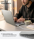 ACS10975 - MacBook Air 15-inch in Heather Gray showing lifestyle shot of working at cafe with charger plugged in; highlights precise cutouts for easy access to all ports