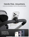 AMP11740 - Stroller Mount | OM200 (Mag Fit) showing a phone magnetically mounted to a stroller handle with an adjustable strap