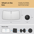 ACP09093 - R1S (2022-2025) Rivian CryoShade RO260 in Black showing what's in the box. Includes one foldable sunshade and custom bag for easy storage. 29inx56in while fully open, 14.2inx14.2in when stored inside the bag. How to fold it? first fold in in half, twisted in each opposite direction, hold it and put it inside the bag