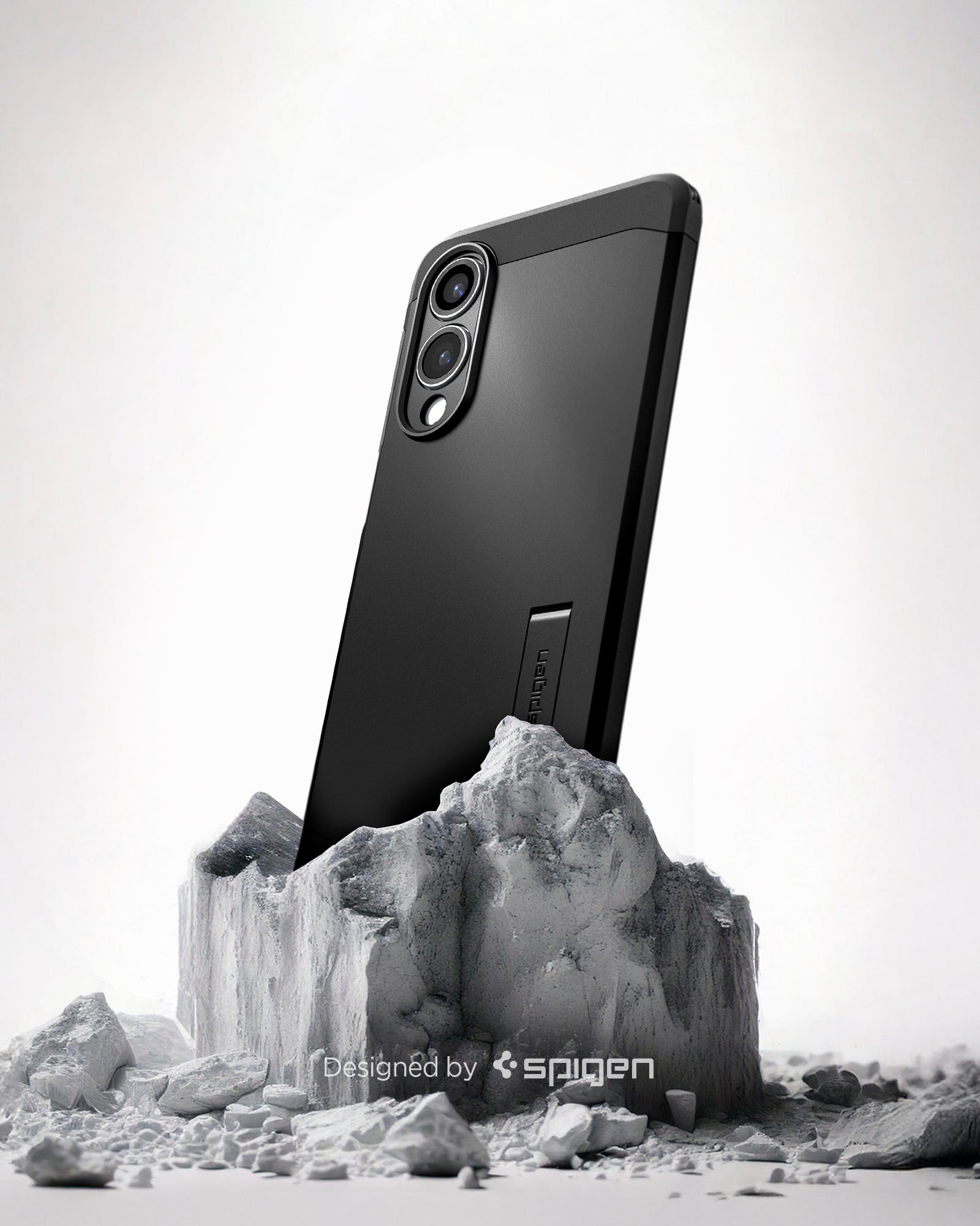ACS09422 - Galaxy S25 Edge Case Tough Armor AI (MagFit) in Black showing the back and partial side, device sitting on the rock