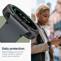 ACS09839 - SWi-dj Liquid Air showing raised edge protection detail with lifestyle shot of woman wearing the cased watch outdoors