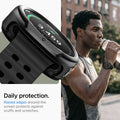ACS11610 - Watch Ultra (47mm) Liquid Air in Matte Black showing a close-up of a smartwatch's raised protective bezel alongside a person wearing the watch while drinking water.