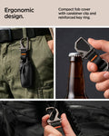 ACS11366 - Toyota Key Fob Cover | TK100 showing key fob cover clipped to belt loop and carabiner used as bottle opener with bag attachment below