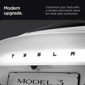 ACP08549 - Tesla Model 3 Highland Rear Emblem Logo Cover TO322H in Black showing the modern upgrade, customize your Tesla with a modern and stylish decal for sleek daily protection